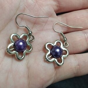 Silver tone purple dangling flower earrings